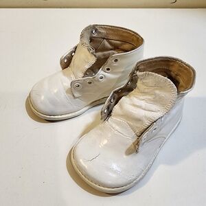 Antique white baby's shoes